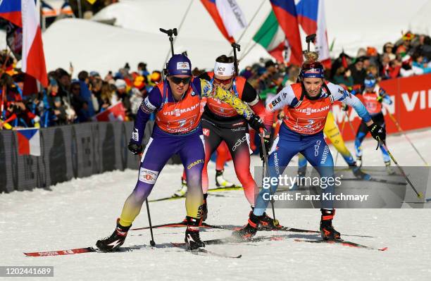 Anastasiya Merkushyna of Ukraine, Synnoeve Solemdal of Norway and Elisa Gasparin of Switzerland competes during in the women 4x6 km Relay Competition...