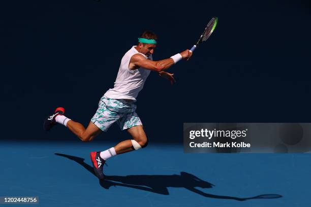 Tennys Sandgren of the United States plays a forehand during his Men’s Singles Quarterfinal match against Roger Federer of Switzerland on day nine of...