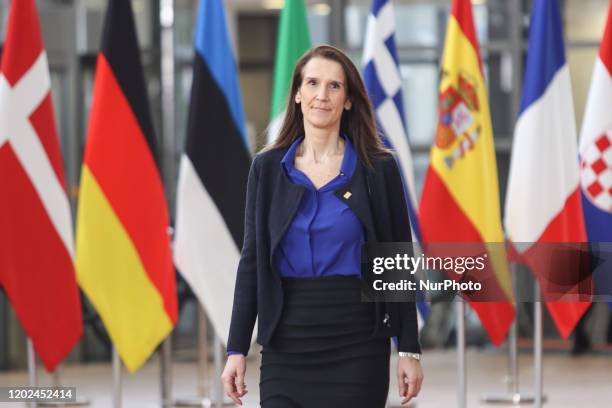 Sophie Wilmes Prime Minister of Belgium as seen arriving on the red carpet with EU flags in the background at forum Europa building and having a...