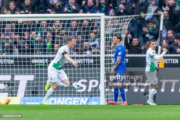 Matthias Ginter of Borussia Moenchengladbach celebrates after scoring his team's first goal during the Bundesliga match between Borussia...