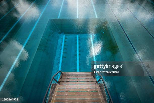 diving tower in a swimming pool from above, germany - diving platform stock pictures, royalty-free photos & images