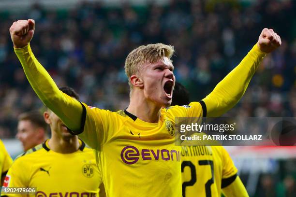 Dortmund's Norwegian forward Erling Braut Haaland celebrates after scoring during the German first division Bundesliga football match Werder Bremen...