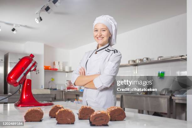 portrait of baker woman - pastry chef stock pictures, royalty-free photos & images