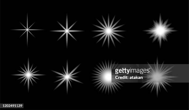 vector glowing lights effect. - star shape stock illustrations