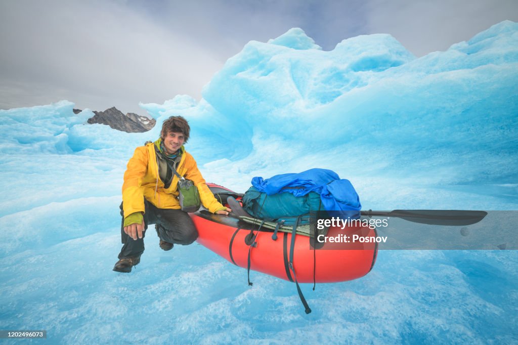Landing on the iceberg with a packraft at Ikateq Fjord