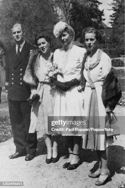 Lieutenant Philip Mountbatten posed with his sisters, from left, Princess Margarita of Greece and Denmark , Princess Sophie of Greece and Denmark and...