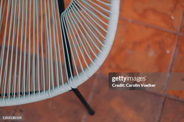 detail of an acapulco chair, a traditional mexican craft product, seen from below - acapulco chair stockfoto's en -beelden