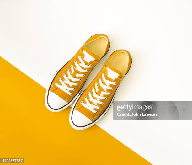 sneakers - yellow shoe stock pictures, royalty-free photos & images