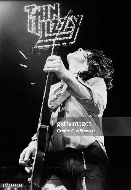 Northern Irish guitarist and singer-songwriter Gary Moore performing live with hard rock band Thin Lizzy, circa 1978.