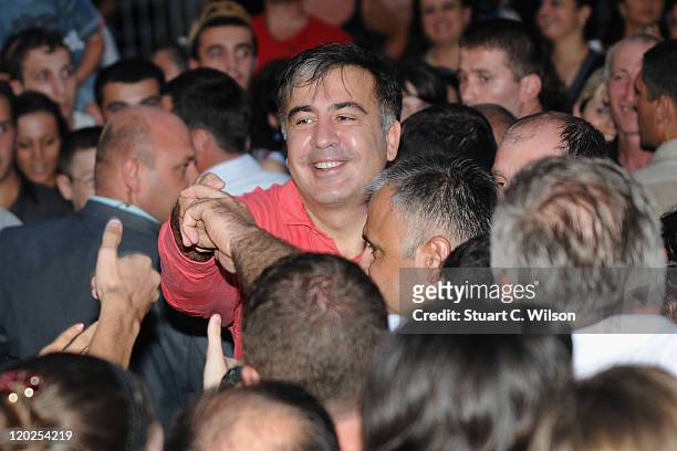 Georgia President Mikheil Saakashvili greets the crowd as he attends MTV Live Georgia at Europe Square on August 2, 2011 in Batumi, Georgia.
