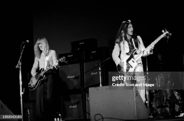 Canadian lead guitarist Alex Lifeson and Canadian bassist and lead vocalist Geddy Lee perform as Rush at the Beacon Theatre, November 5 in New York,...