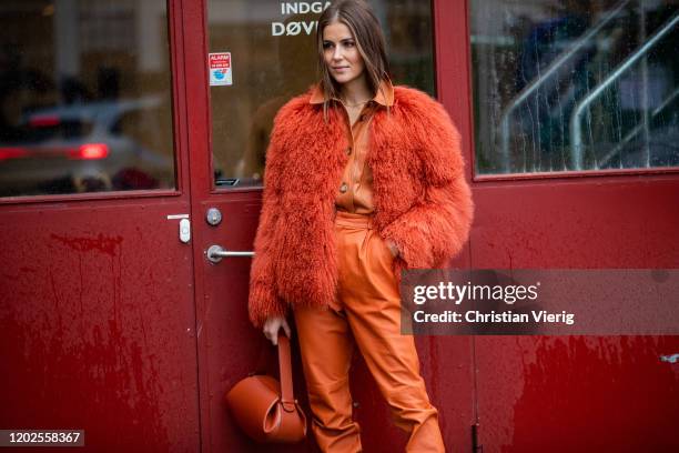 Nina Sandbech seen wearing orange pants, button shirt, faux fur jacket, bag outside Carcel on Day 1 during Copenhagen Fashion Week Autumn/Winter 2020...