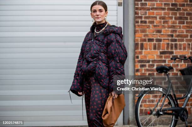 Guest is seen wearing down feather jacket outside Mykke Hofmann on Day 1 during Copenhagen Fashion Week Autumn/Winter 2020 on January 28, 2020 in...