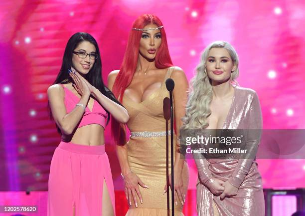 Adult film actresses Alex Coal, Nicolette Shea and Violet Doll present an award during the 2020 Adult Video News Awards at The Joint inside the Hard...