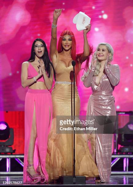 Adult film actresses Alex Coal, Nicolette Shea and Violet Doll present an award during the 2020 Adult Video News Awards at The Joint inside the Hard...