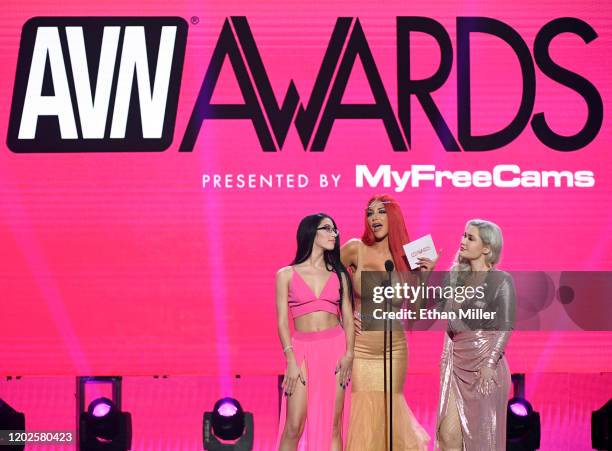 Adult film actresses Alex Coal, Nicolette Shea and Violet Doll present an award during the 2020 Adult Video News Awards at The Joint inside the Hard...