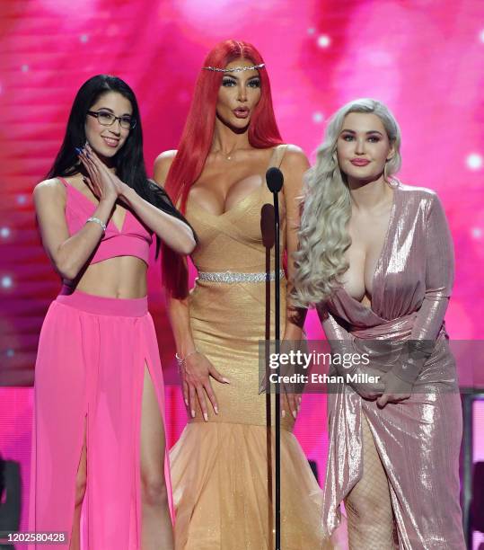 Adult film actresses Alex Coal, Nicolette Shea and Violet Doll present an award during the 2020 Adult Video News Awards at The Joint inside the Hard...