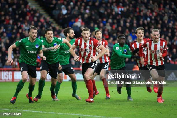 Jack O'Connell of Sheff Utd leads the charge as players from both sides compete for position during the Premier League match between Sheffield United...