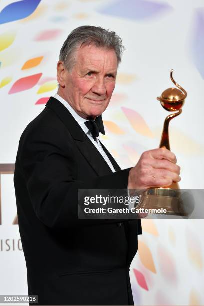 Sir Michael Palin winner of the Special Recognition Award poses in the winners room during the National Television Awards 2020 at The O2 Arena on...