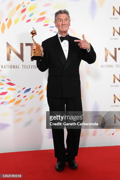 Sir Michael Palin winner of the Special Recognition Award poses in the winners room during the National Television Awards 2020 at The O2 Arena on...