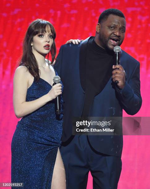 Adult film actress and 2020 AVN Trophy Girl Aliya Brynn and actor/comedian Aries Spears speak during the 2020 Adult Video News Awards at The Joint...