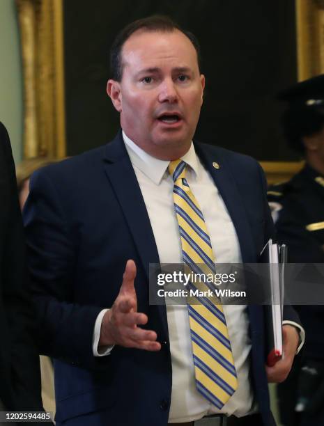 Sen. Mike Lee walks to a GOP caucus meeting after President Donald Trump's impeachment trial ended for the day, at the U.S. Capitol on January 28,...