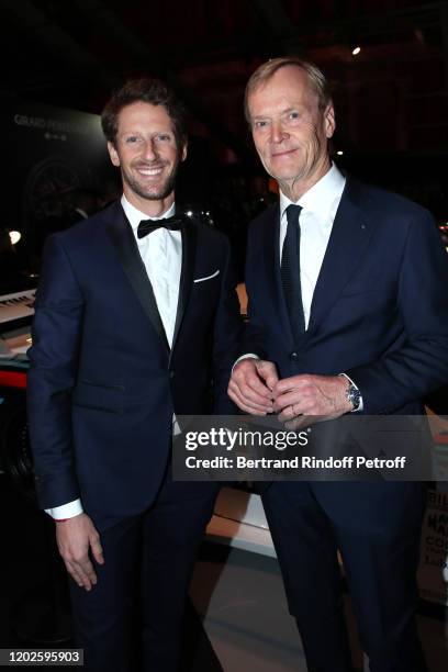 Formula One pilot Romain Grosjean and Ari Vatanen attend the 35th International Automobile Festival at Hotel des Invalides on January 28, 2020 in...