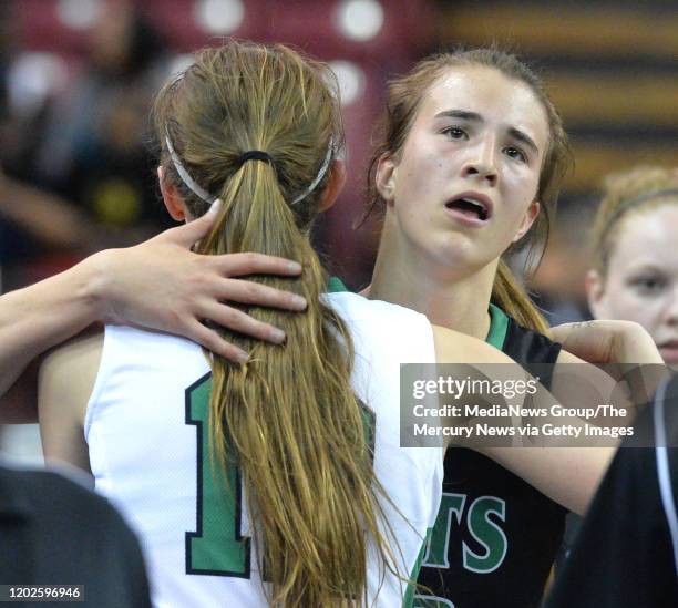 Miramonte High's Sabrina Ionescu right, congratulates St. Mary's Kat Tudor after the Matadors lost their CIF Northern regional basketball...