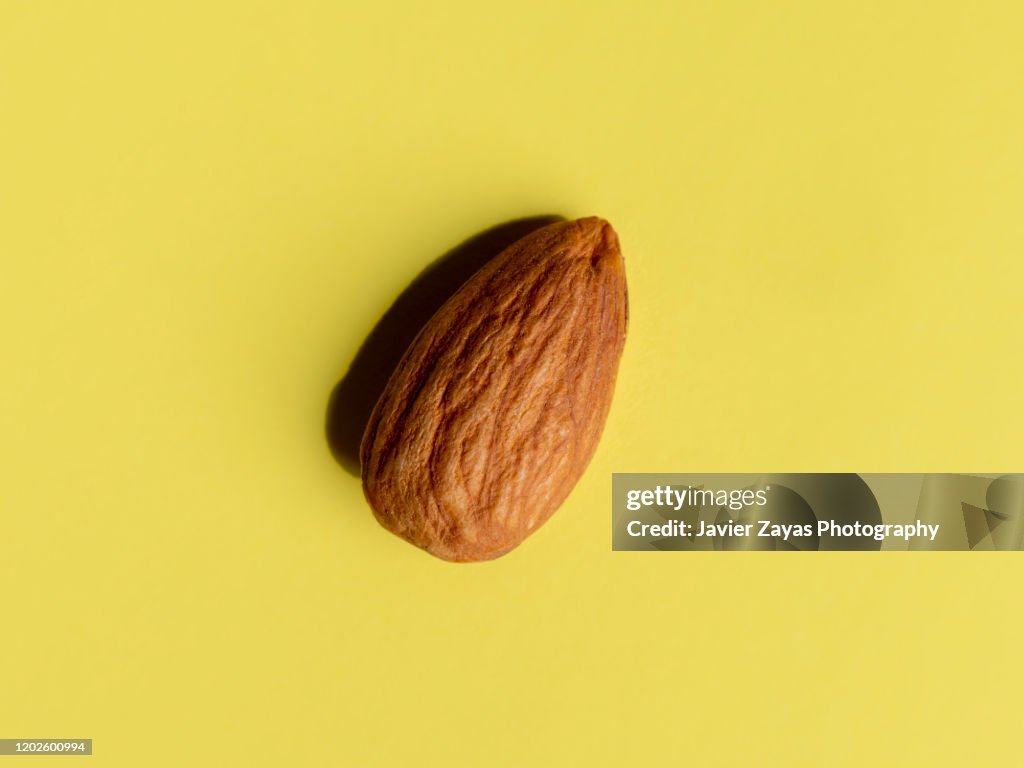 Almond On Yellow Background