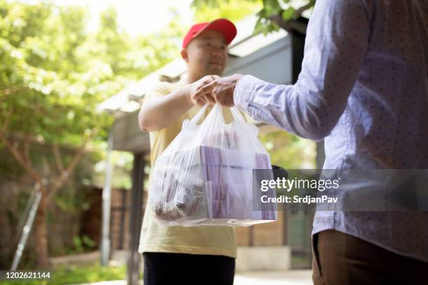 delivering take away food was never quicker - quicker stock pictures, royalty-free photos & images