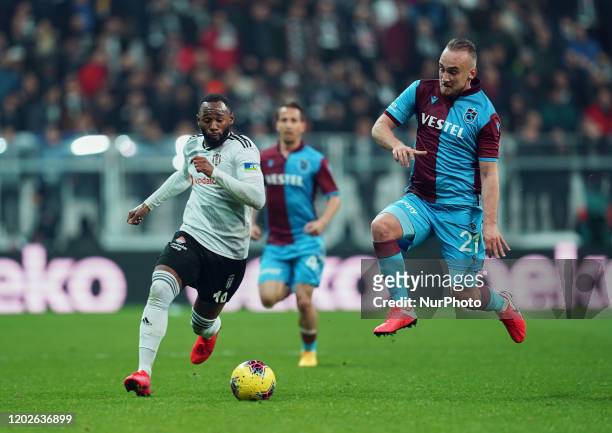 Dogan Erdogan of Trabzonspor and Georges-Kevin N'Koudou of Besiktas challenging for the ball during Besiktas against Trabzonspor on Vodafone Park,...