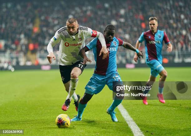 Burak Yilmaz of Besiktas going past Badou Ndiaye of Trabzonspor during Besiktas against Trabzonspor on Vodafone Park, Istanbul, Turkey on February...