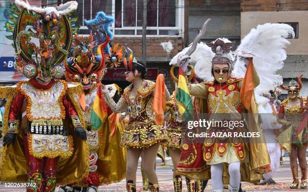 Graphic content / Members of the Diabada carnival group participate in the inaugural parade of the Carnival of Oruro, one of UNESCO's Masterpieces of...