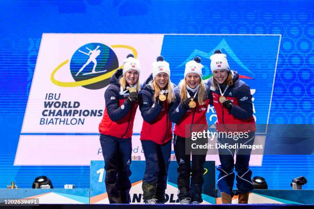 Marte Olsbu Roeiseland of Norway, Tiril Eckhoff of Norway, Ingrid Landmark Tandrevold of Norway and Synnoeve Solemdal of Norway at the medal ceremony...