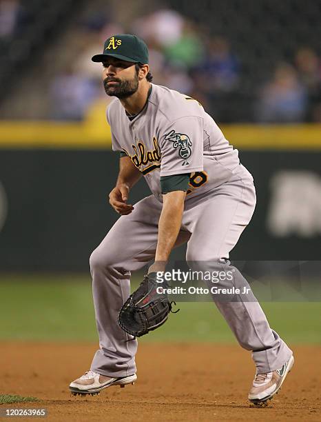 Conor Jackson of the Oakland Athletics watches the pitch during the game against the Seattle Mariners at Safeco Field on August 1, 2011 in Seattle,...