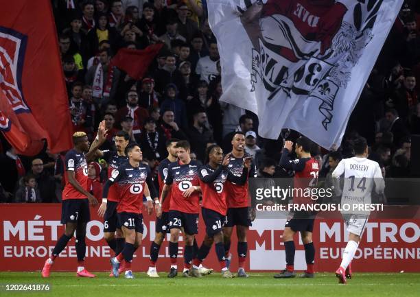 Lille's Portugese midefielder Renato Sanches celebrates with teammates after scoring a goal during the French L1 football match between Lille and...