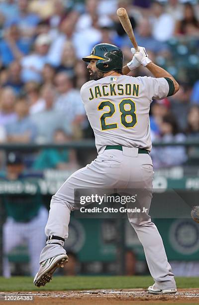 Conor Jackson of the Oakland Athletics bats against the Seattle Mariners at Safeco Field on August 1, 2011 in Seattle, Washington.