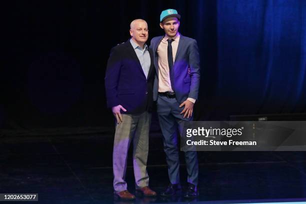 Managing Director of the NBA 2K League, Brendan Donohue poses for a photo with Expose after being drafted number six overall by Hornets Venom GT...