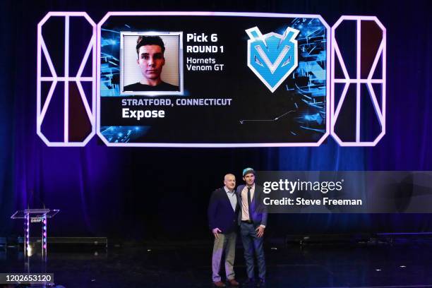 Managing Director of the NBA 2K League, Brendan Donohue poses for a photo with Expose after being drafted number six overall by Hornets Venom GT...