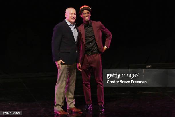 Managing Director of the NBA 2K League, Brendan Donohue poses for a photo with Lee after being drafted number sixteen overall by Hawks Talon GC...