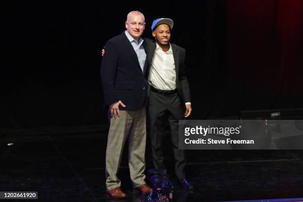 Managing Director of the NBA 2K League, Brendan Donohue poses for a photo with Sleetys_ after being drafted in the second round by Mavs Gaming during...