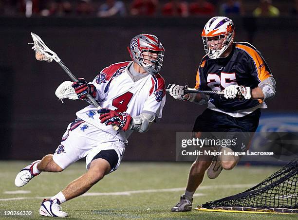 Stephen Boyle of the Boston Cannons drives to his right on the way to the goal against Mike Timms of the Toronto Nationals on July 24, 2010 at...