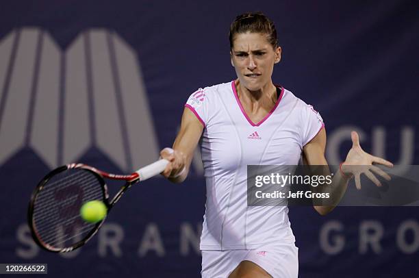 Andrea Petkovic of Germany returns a forehand to Alexa Glatch during the Mercury Insurance Open presented by Tri-City Medical at the La Costa Resort...