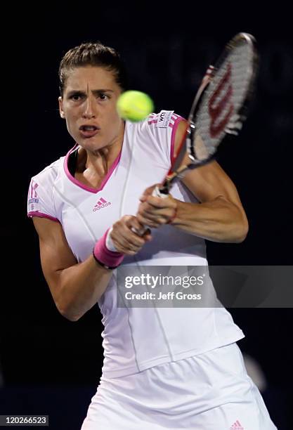 Andrea Petkovic of Germany returns a backhand to Alexa Glatch during the Mercury Insurance Open presented by Tri-City Medical at the La Costa Resort...