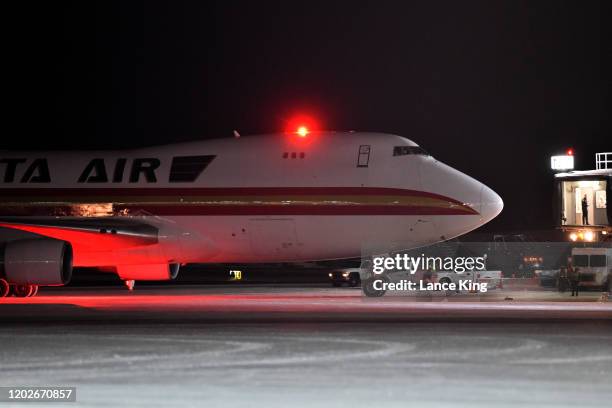 Boeing 747-4B5, on a charter flight from Wuhan, China, arrives at Ted Stevens Anchorage International Airport on January 28, 2020 in Anchorage,...