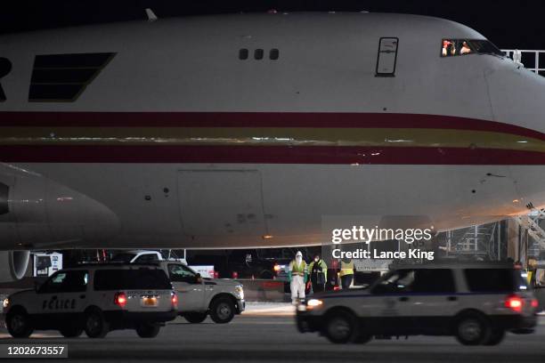 Boeing 747-4B5, on a charter flight from Wuhan, China, arrives at Ted Stevens Anchorage International Airport on January 28, 2020 in Anchorage,...