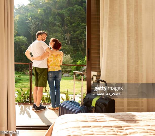 we picked a great place to stay! - bedroom balcony view stock pictures, royalty-free photos & images