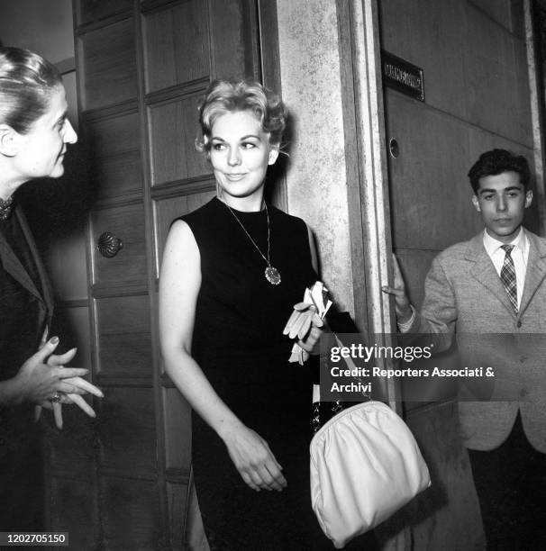 American actress Kim Novak leaving the Sorelle Fontana fashion house, established by sisters and Italian fashion designers Zoe, Micol and Giovanna....