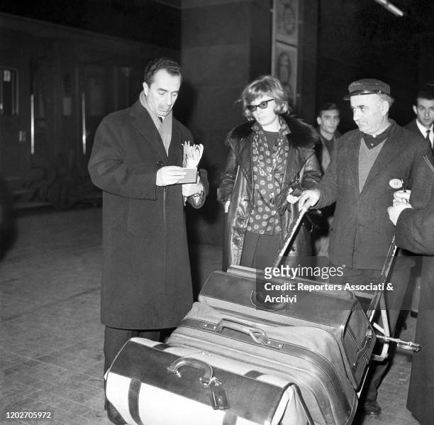 Italian actress Monica Vitti at Termini station, leaving for Paris. Rome, 1958