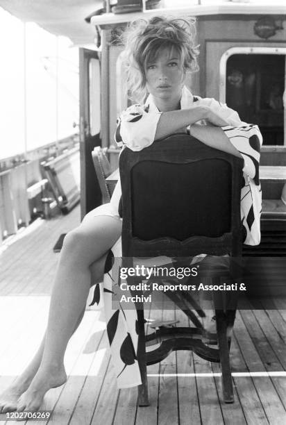 Italian actress Monica Vitti posing on Angelo Rizzoli's yacht. Ischia, 1957